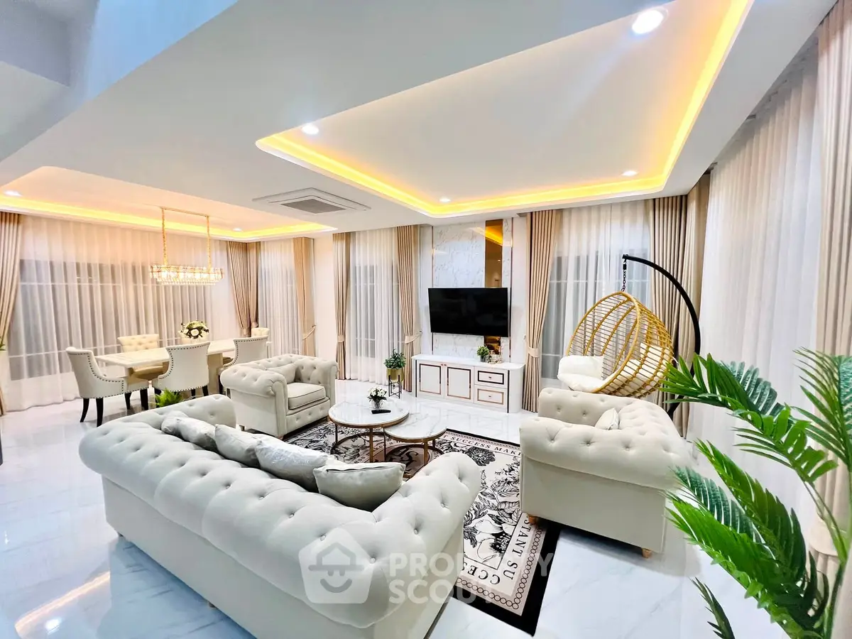 Luxurious living room with elegant furniture and ambient lighting, perfect for modern living.