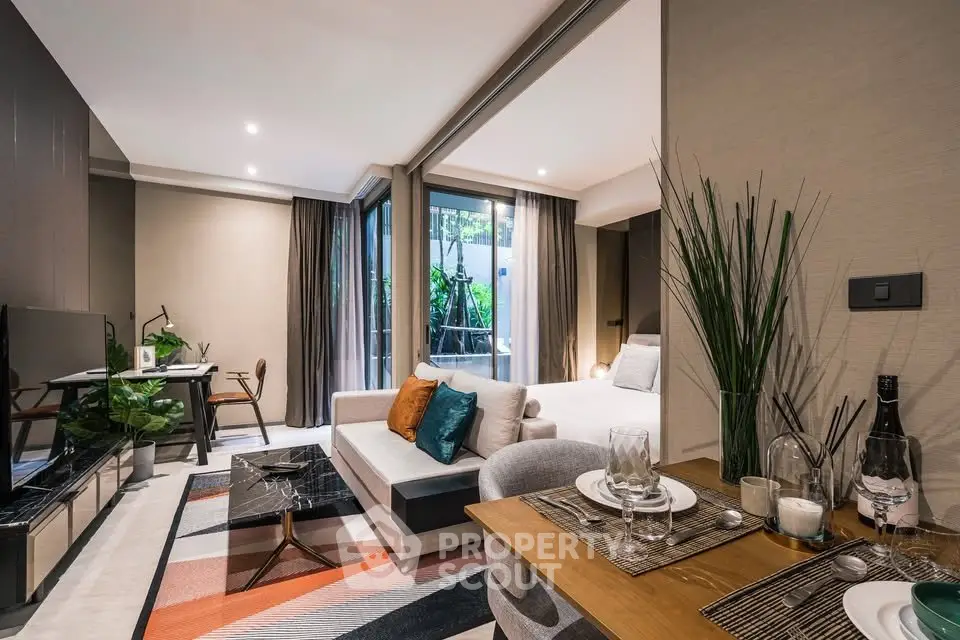 Modern open-plan living room with stylish decor and natural light