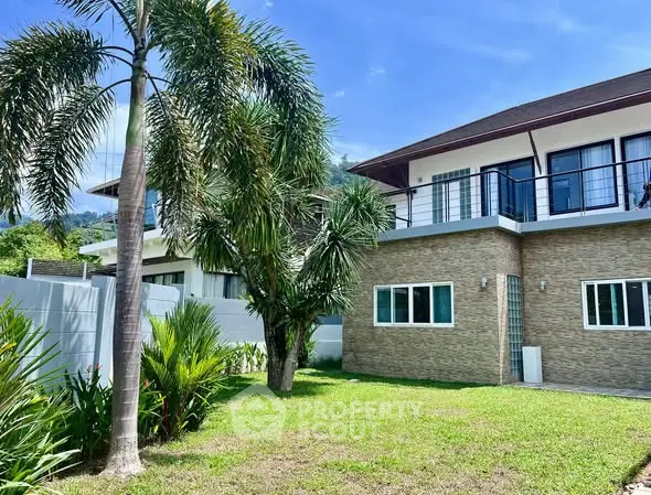 Stunning modern home with lush garden and spacious balcony, perfect for luxury living.