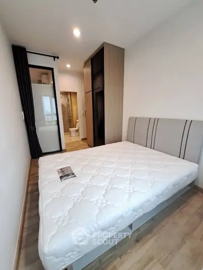 Modern bedroom with ensuite bathroom and stylish decor