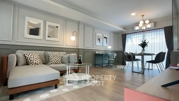 Spacious modern living room with elegant decor and dining area