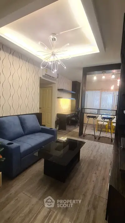 Modern living room with stylish lighting and open layout