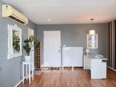 Stylish modern living room with elegant decor and wooden flooring