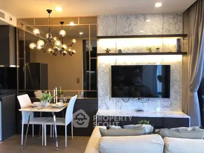 Luxurious living room with modern decor and elegant dining area