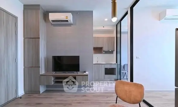 Modern living room with open kitchen and stylish decor