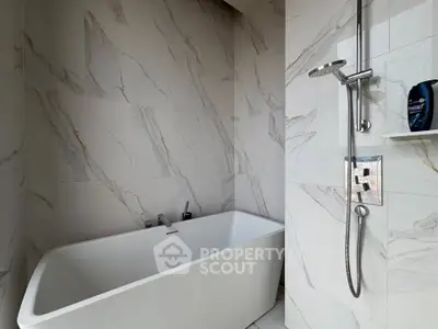 Luxurious bathroom with elegant marble tiles and modern bathtub