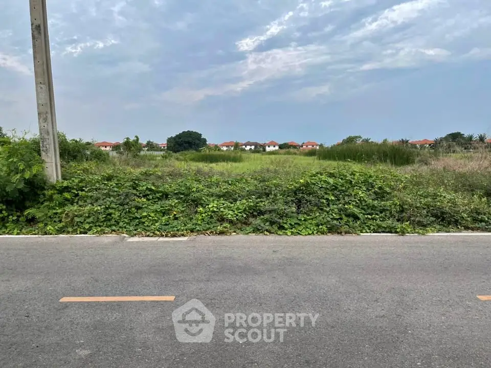 Prime land plot with road access and scenic views, ideal for development opportunities.