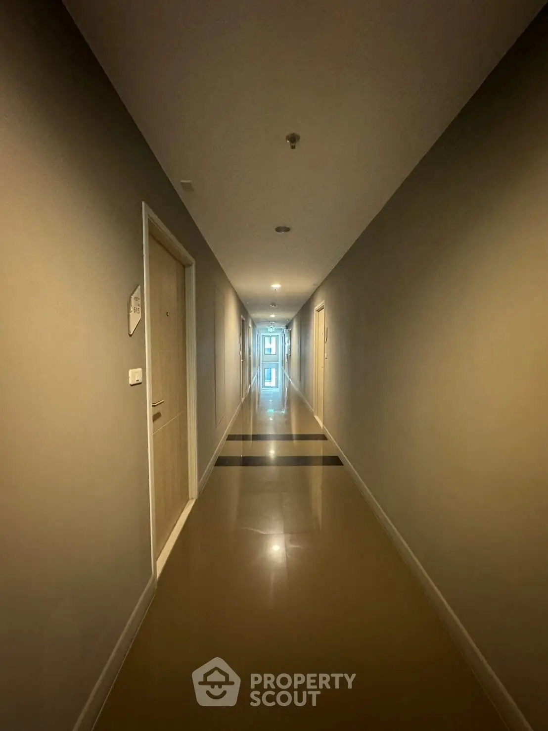 Modern apartment corridor with sleek design and polished floors