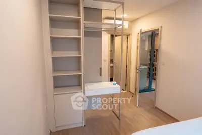 Modern bedroom with built-in storage and sleek design