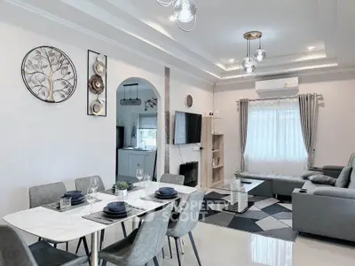 Modern living room with elegant dining area and stylish decor