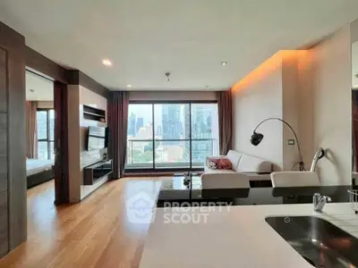 Modern living room with city view, open layout, and stylish decor.