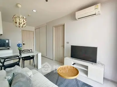 Modern living room with air conditioning and stylish furniture