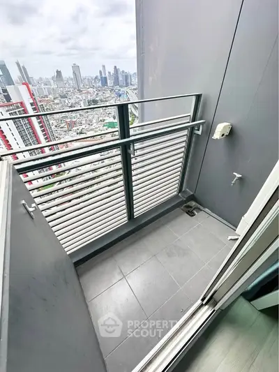 Modern high-rise balcony with stunning cityscape view, perfect for urban living enthusiasts.