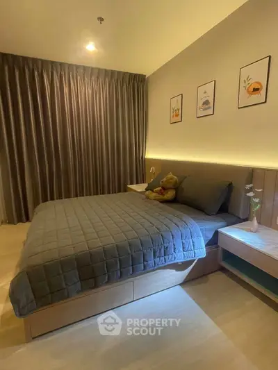 Cozy modern bedroom with stylish decor and ambient lighting