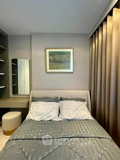 Cozy bedroom with elegant decor and stylish furnishings, perfect for relaxation.