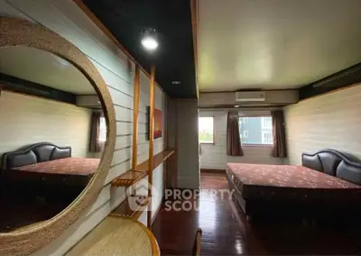 Spacious bedroom with double bed and stylish decor in modern apartment