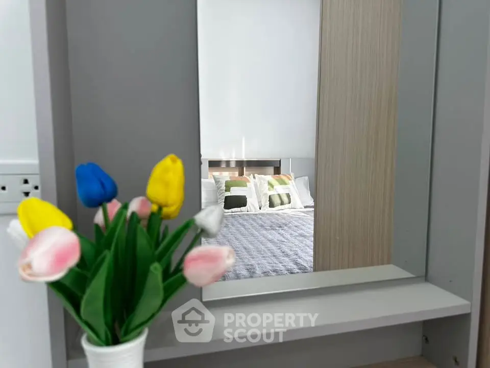 Stylish bedroom with modern decor and cozy bedding