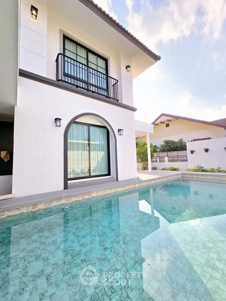 Luxurious modern home with stunning pool and elegant architecture