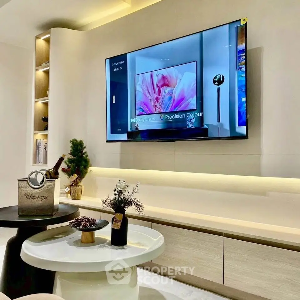 Modern living room with sleek TV and elegant decor