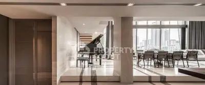 Luxurious modern living room with grand piano and city view, perfect for entertaining.
