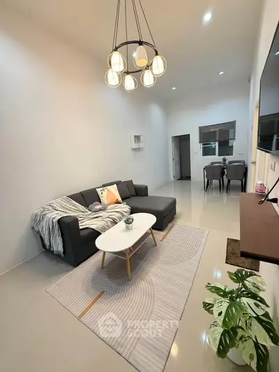 Modern living room with stylish decor and cozy seating area