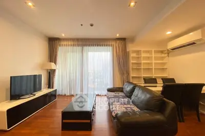 Spacious living room with modern furniture and natural light