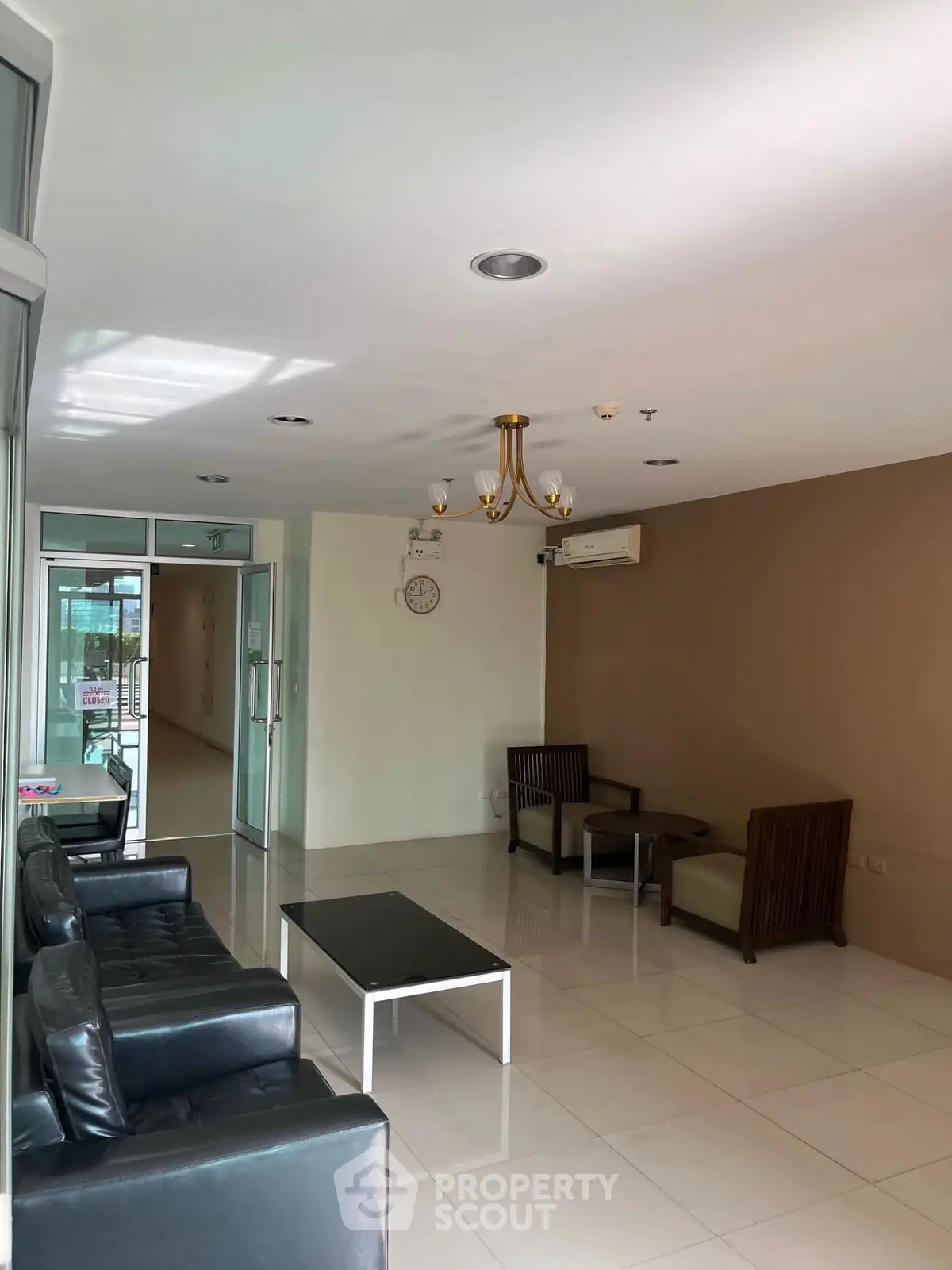 Spacious modern lobby with elegant seating and natural light