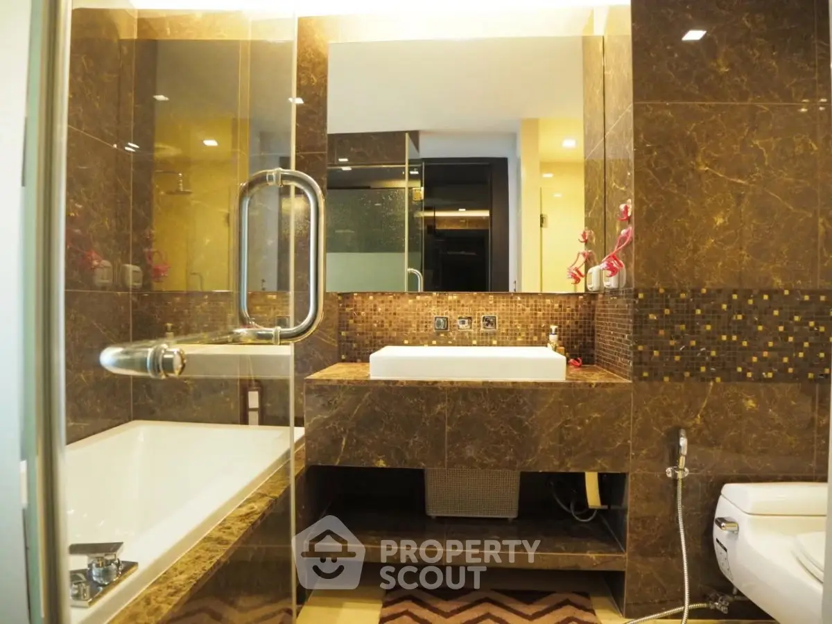 Luxurious bathroom with elegant marble finishes and modern fixtures