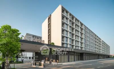 Modern apartment building exterior with sleek design and spacious entrance