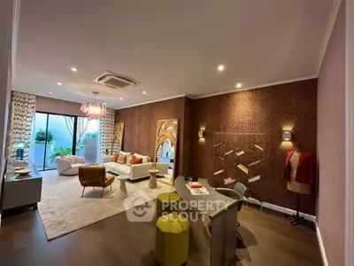 Stylish living room with modern decor and garden view, perfect for relaxation and entertaining.