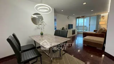 Spacious living room with modern dining area and stylish decor