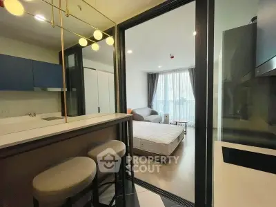 Modern studio apartment with open layout and stylish furnishings