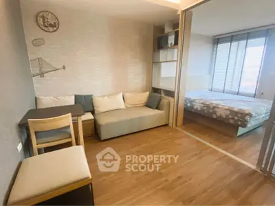 Cozy studio apartment with wooden flooring and modern decor