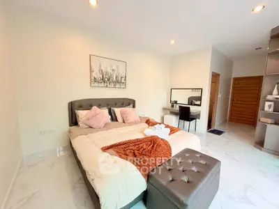 Luxurious bedroom with elegant decor and modern furnishings, perfect for relaxation and comfort.