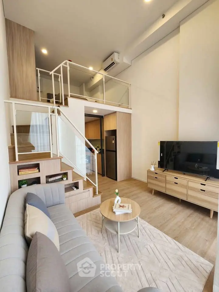 Modern loft-style living room with high ceilings and elegant decor