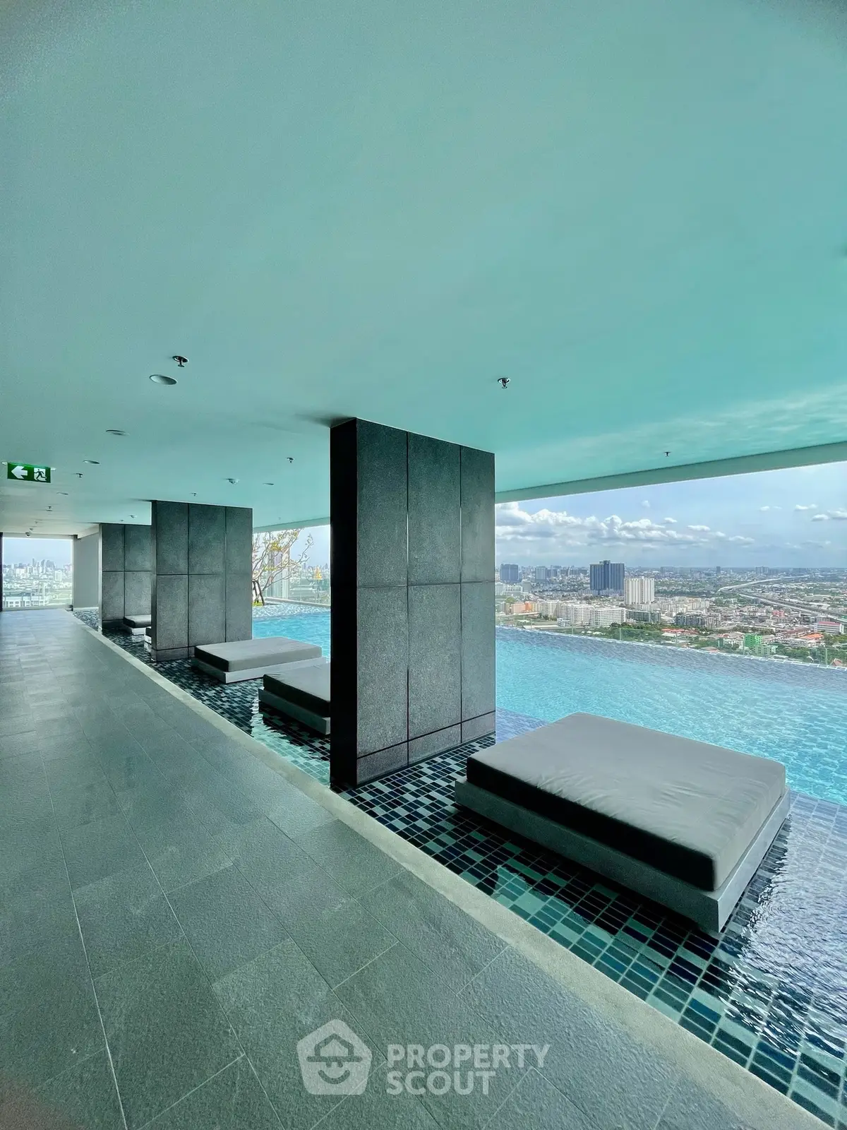 Luxurious rooftop infinity pool with stunning city views and modern design.