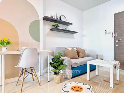 Charming living room with modern decor and cozy seating area.