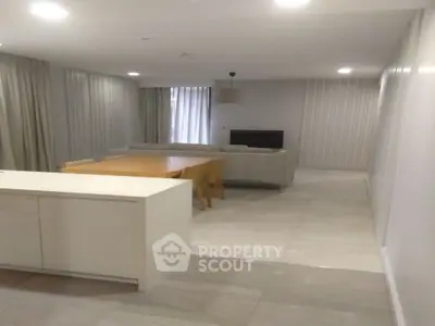 Spacious modern living room with open layout and elegant decor