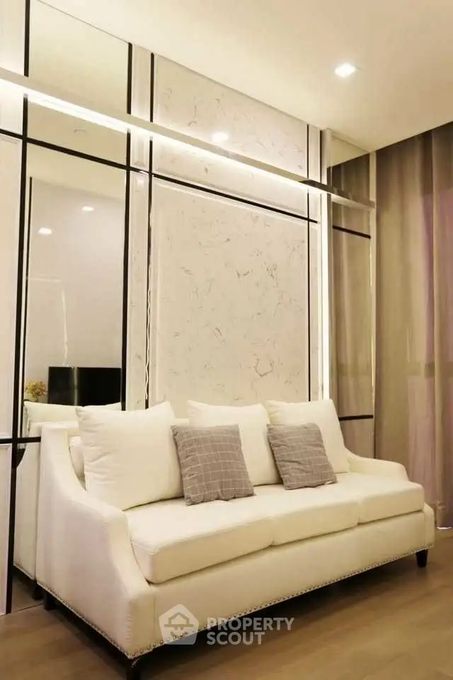 Elegant living room with modern white sofa and stylish decor