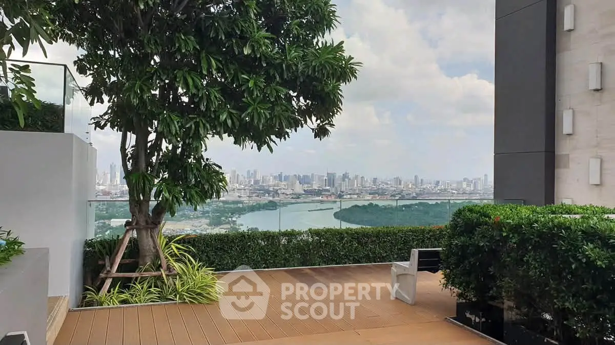 Stunning rooftop view with lush greenery and city skyline, perfect for relaxation and entertainment.