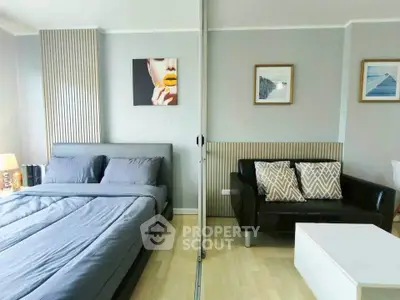 Modern studio apartment with stylish decor and cozy furnishings