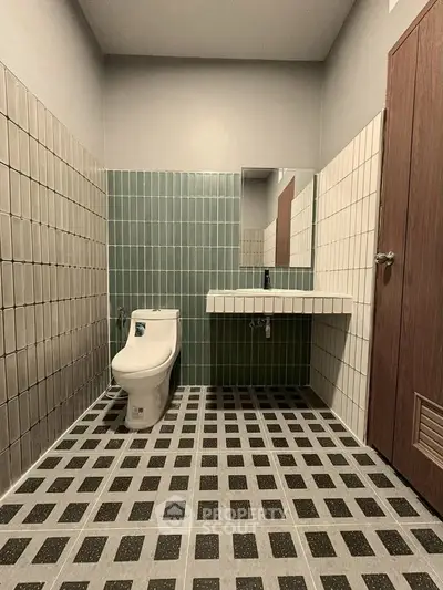Modern bathroom with stylish tile design and sleek fixtures