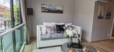 Stylish living room with modern decor and large window view