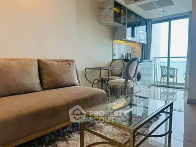 Modern living room with elegant furniture and balcony view in a stylish apartment.