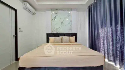 Modern bedroom with elegant decor and natural light