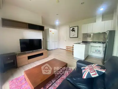 Modern living room with stylish decor and open kitchen layout