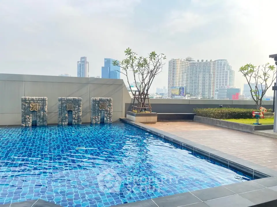Luxurious rooftop pool with city skyline view, perfect for relaxation and leisure.