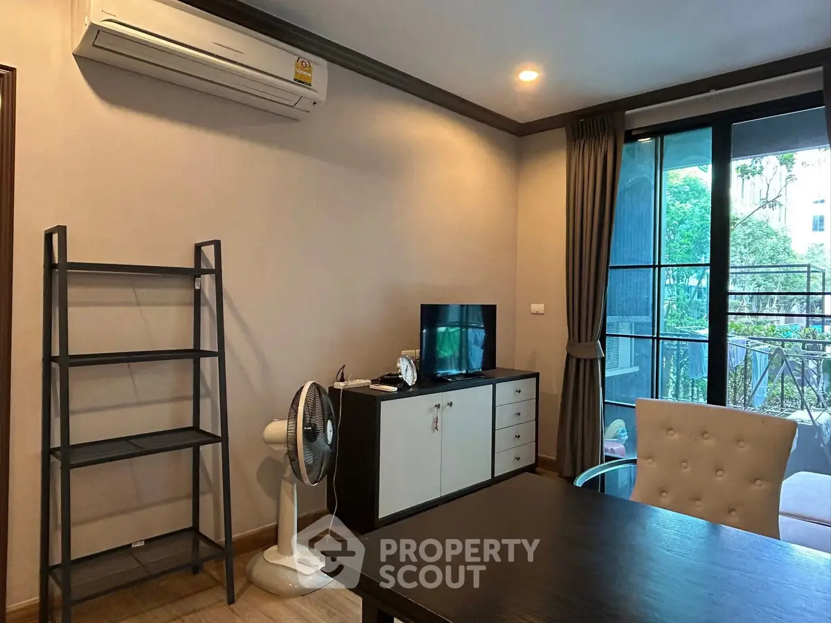 Modern living room with air conditioning and garden view balcony