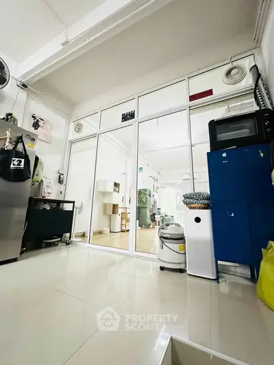 Spacious interior with modern appliances and sleek design, perfect for urban living.