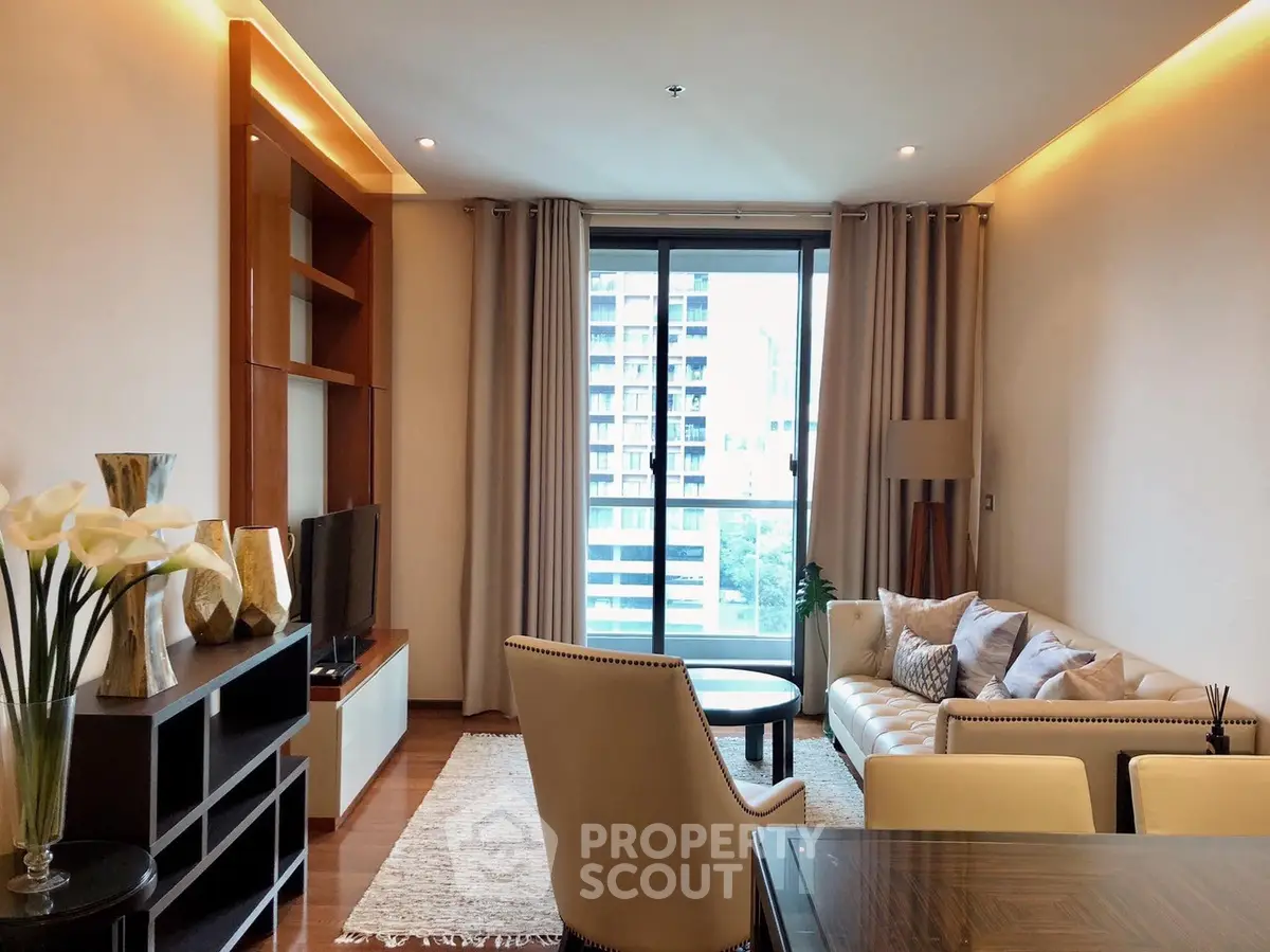 Luxurious living room with modern decor and large window offering city view